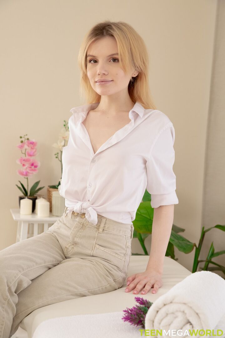 Cutie relaxes on massage table