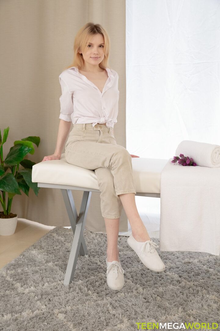 Cutie relaxes on massage table