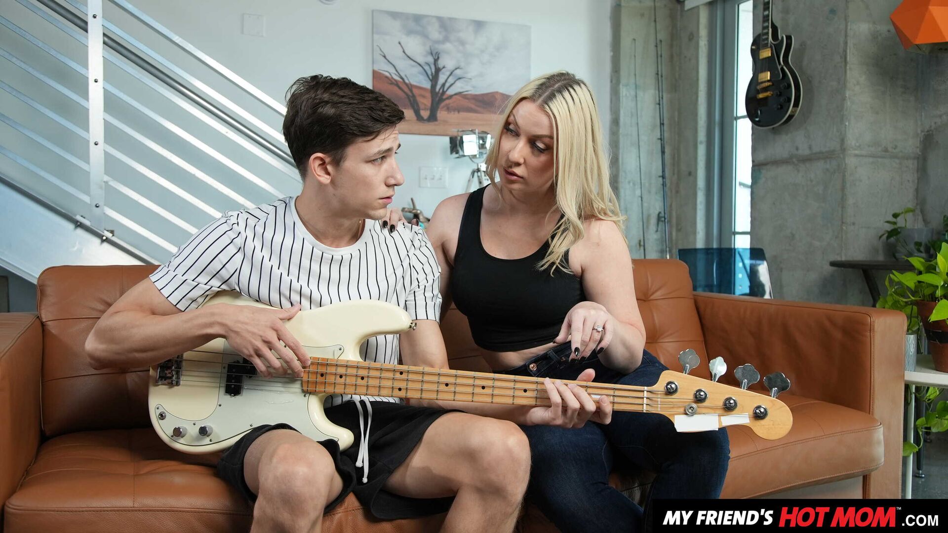Blonde MILF Sydney Paige teaches son's friend how to finger his bass guitar... and her pussy