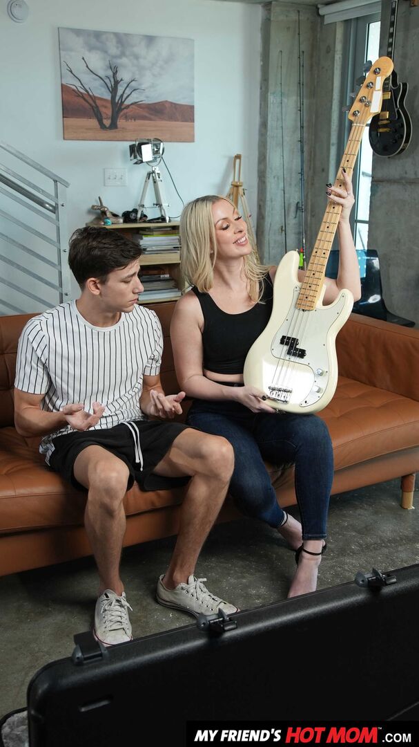 Blonde MILF Sydney Paige teaches son's friend how to finger his bass guitar... and her pussy