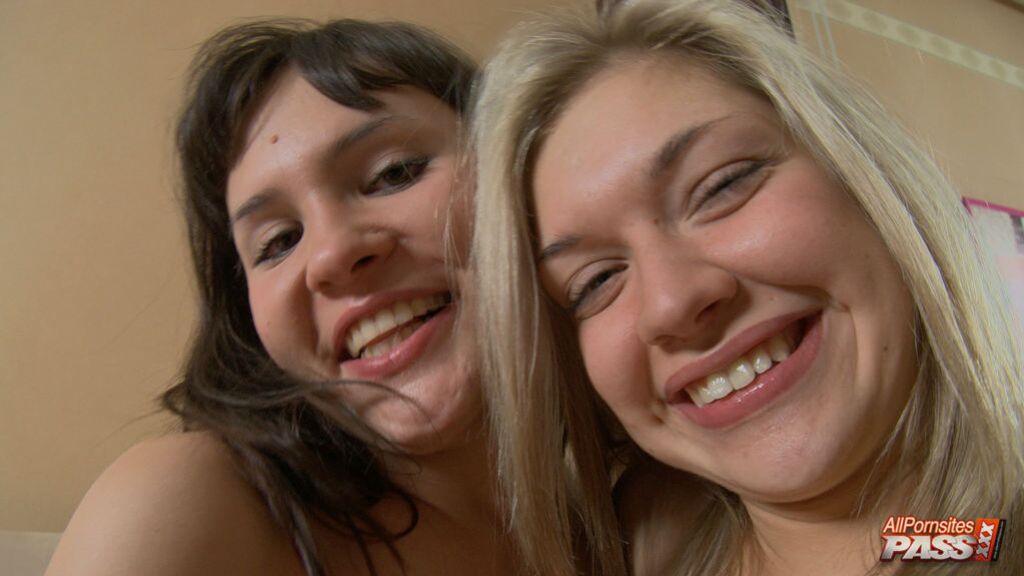 Hot BFFs sharing a huge dildo