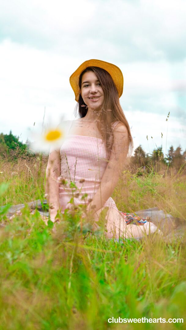 Orgasming surrounded by flowers