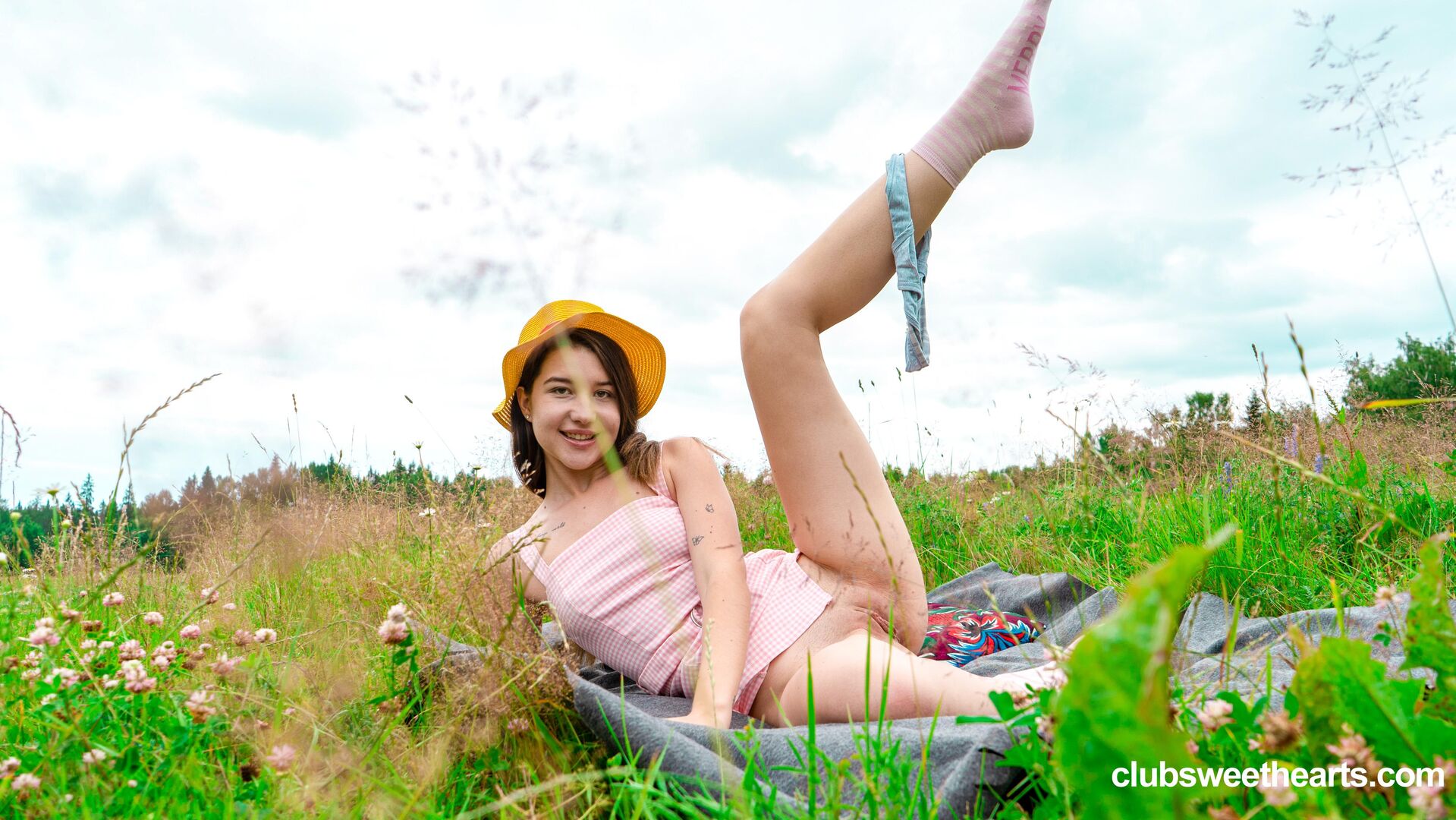 Orgasming surrounded by flowers