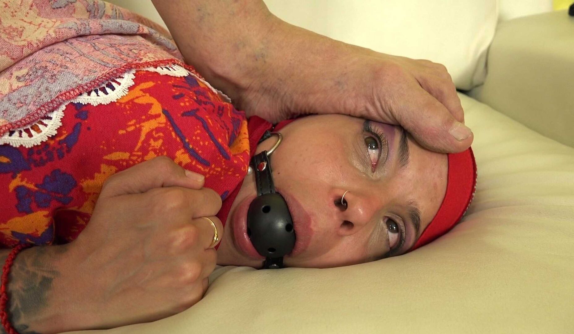 The woman in the hijab was too noisy, so she got gagged