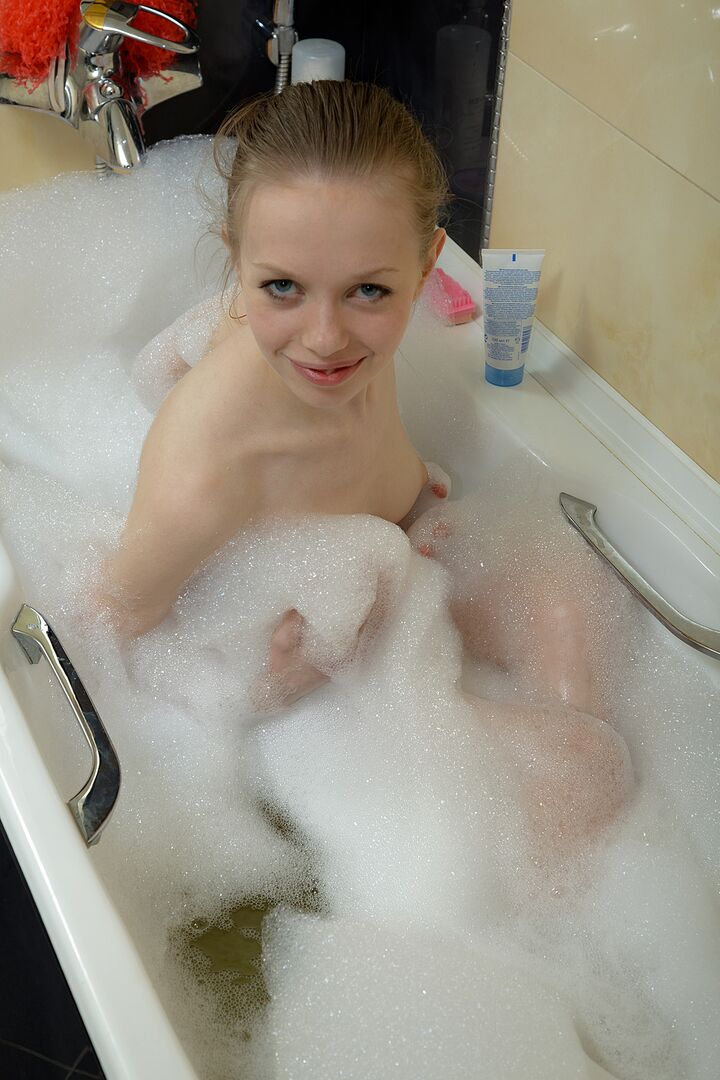 Cute Skinny Teen Takes a Sexy Soapy Bath