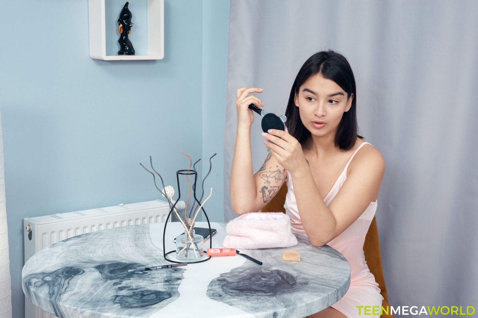 Lonely brunette enjoys a toy