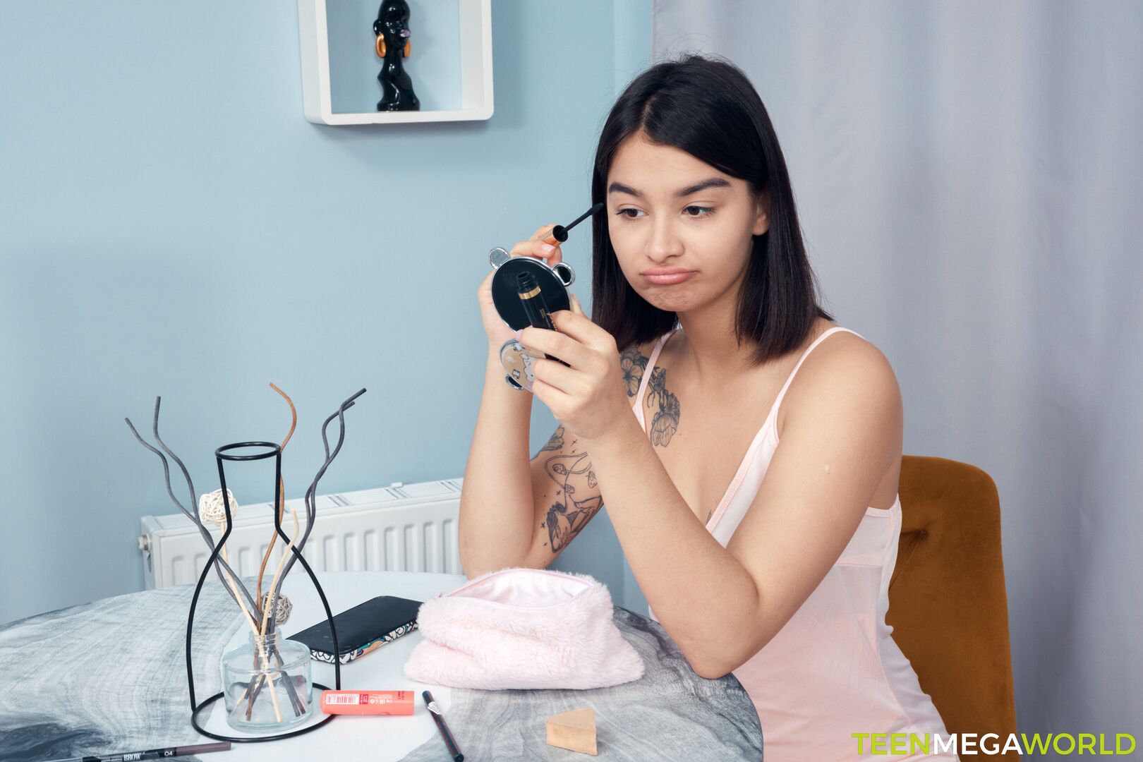 Lonely brunette enjoys a toy