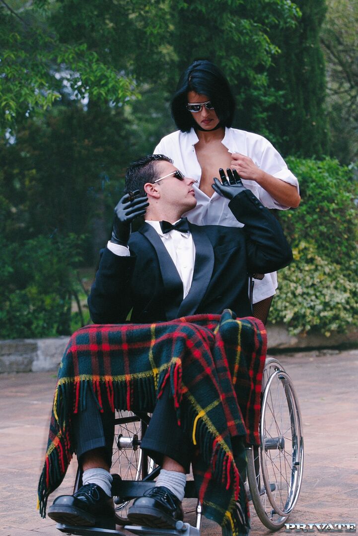 Tavalia Sucks Pussy and Fucks a Guy in a Wheelchair in a Psychedelic Scene