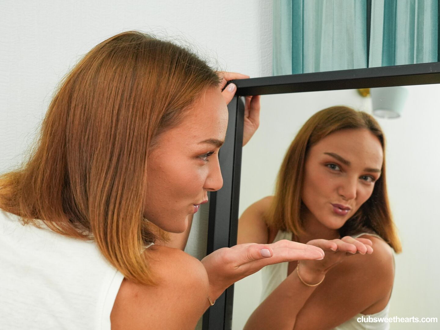 Olivia's nipples get hard in the mirror