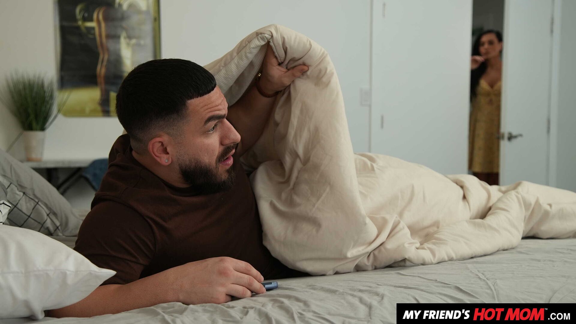 Latina MILF Sandy Love finds a nice hard cock under the sheets