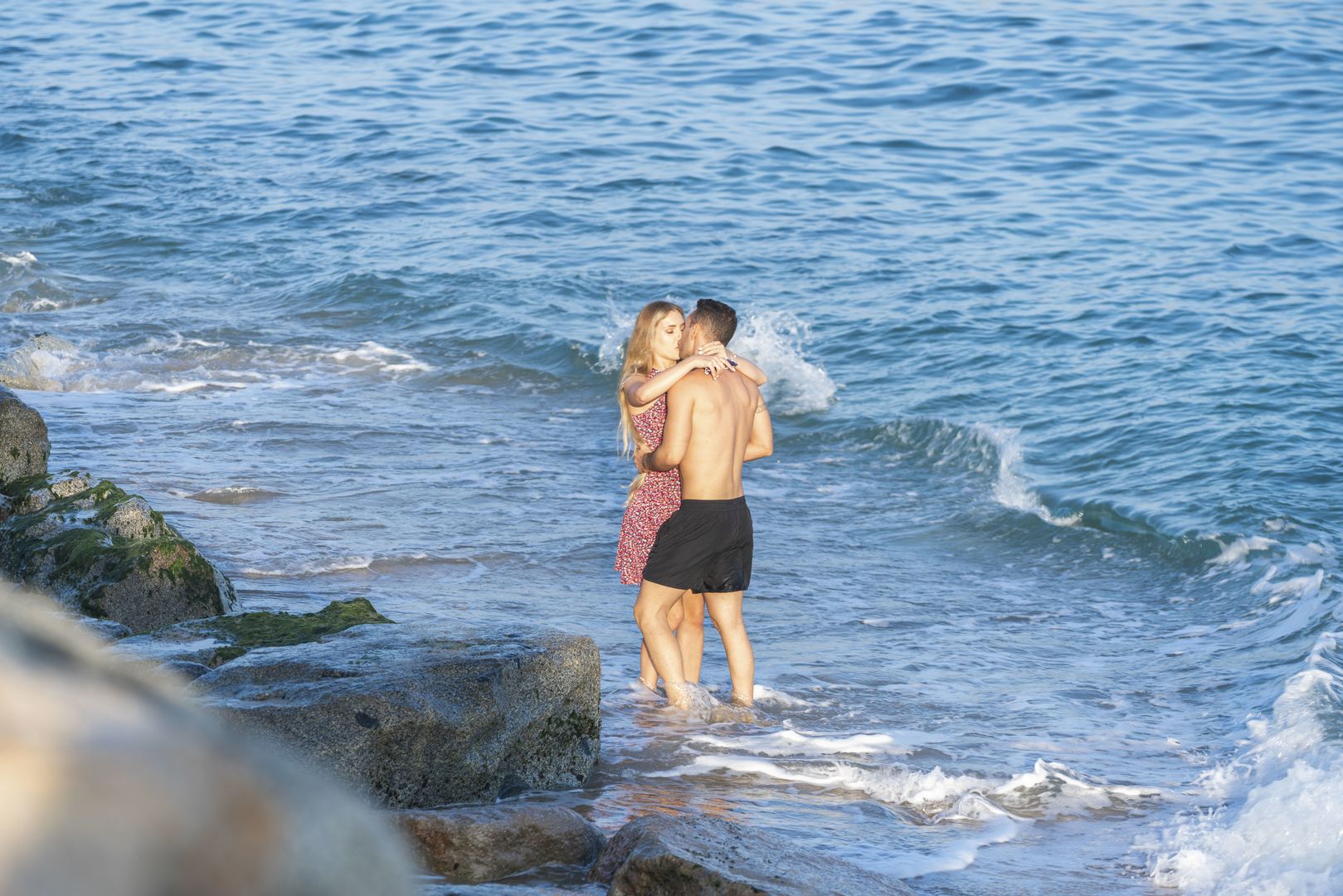 Romantic young couple sex at sunset