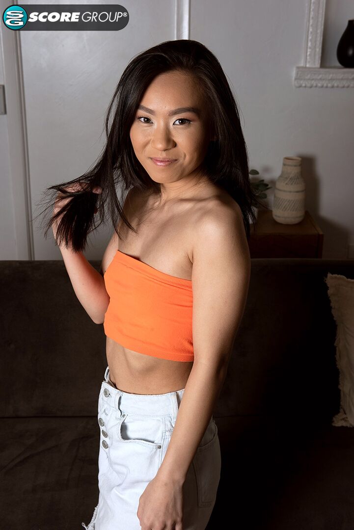 ASIAN COCKTEASE KIMMY GIVES YOU A PEEK AT HER TINY TITS AND HAIRLESS PUSSY IN A GREAT MASTURBATION SCENE.