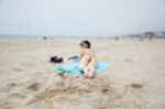 Big tits on the beach