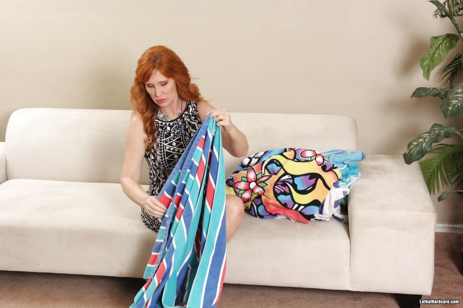 Older Redhead Babe Seduces A Younger Man