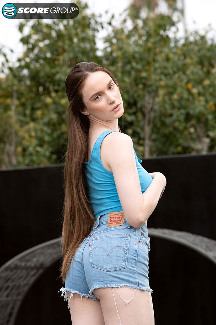 BEAUTIFUL BRUNETTE TEEN HAZEL SHOWS OFF HER HAIRY PUSSY AND MASTURBATES OUTDOORS.