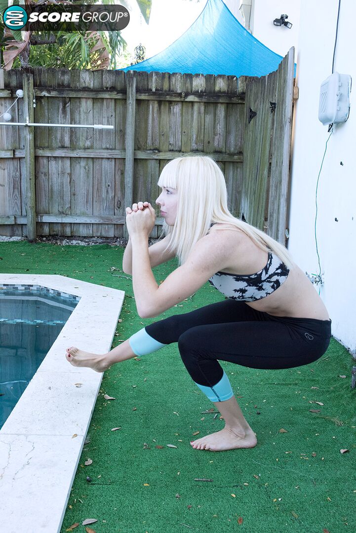 Yoga chick Sveera stretches outside and then loses her yoga clothes, spreads and fingers her snatch.