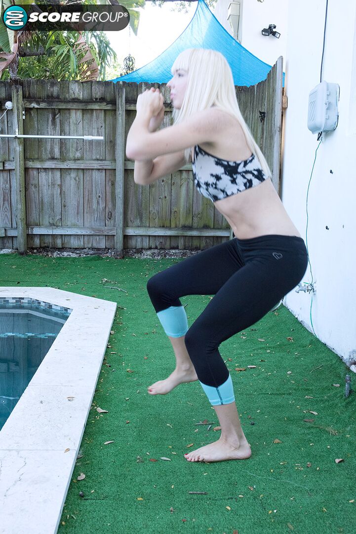 Yoga chick Sveera stretches outside and then loses her yoga clothes, spreads and fingers her snatch.
