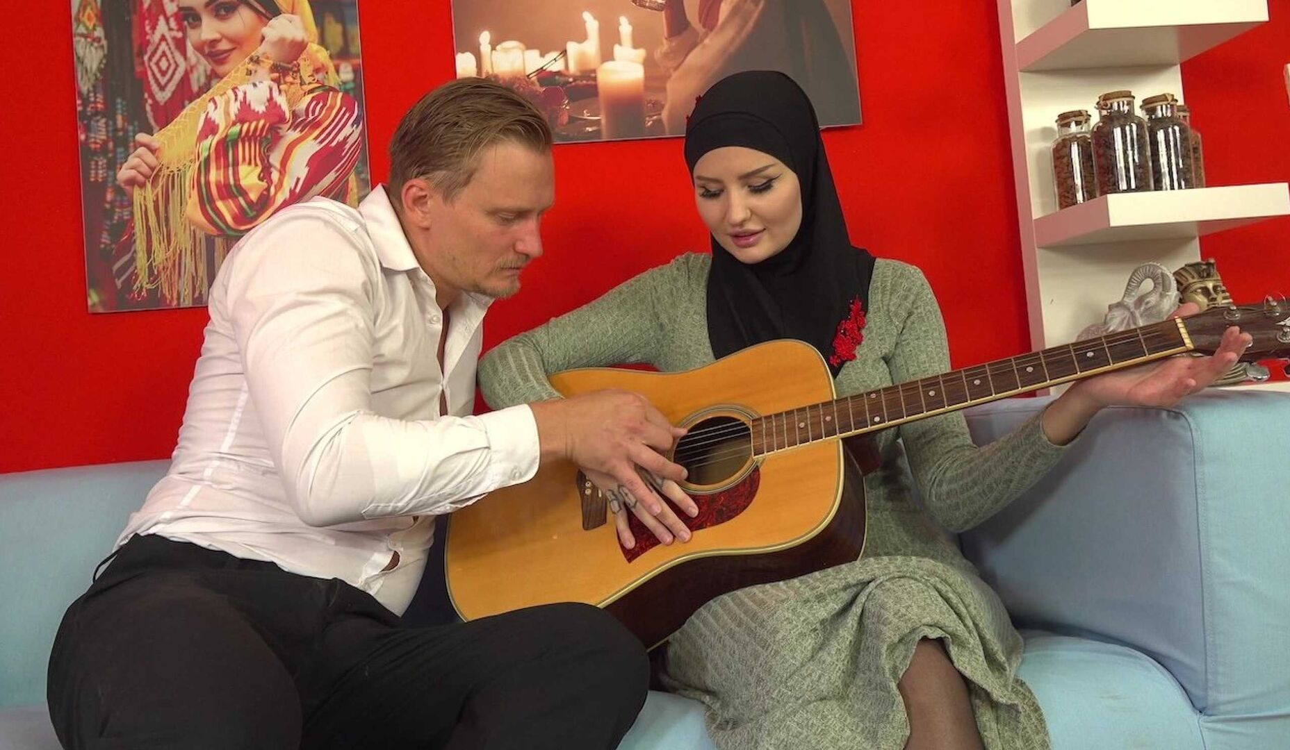 She's better at holding a dick than a guitar