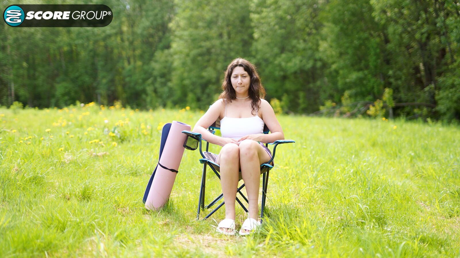 Big-titted teenager Lola shows off her big cans and ample booty in the great outdoors.