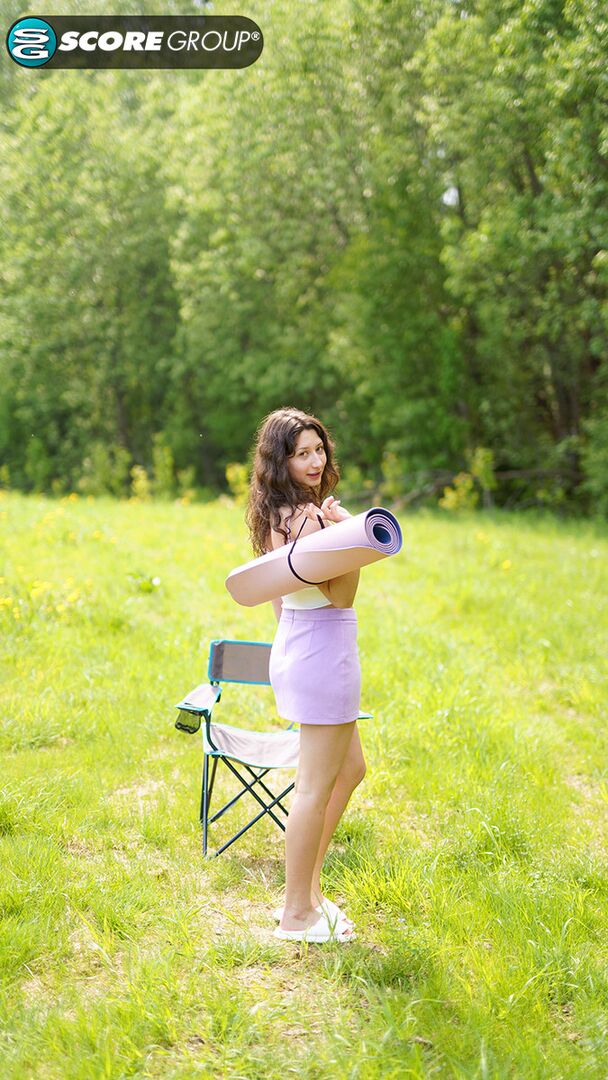 Big-titted teenager Lola shows off her big cans and ample booty in the great outdoors.