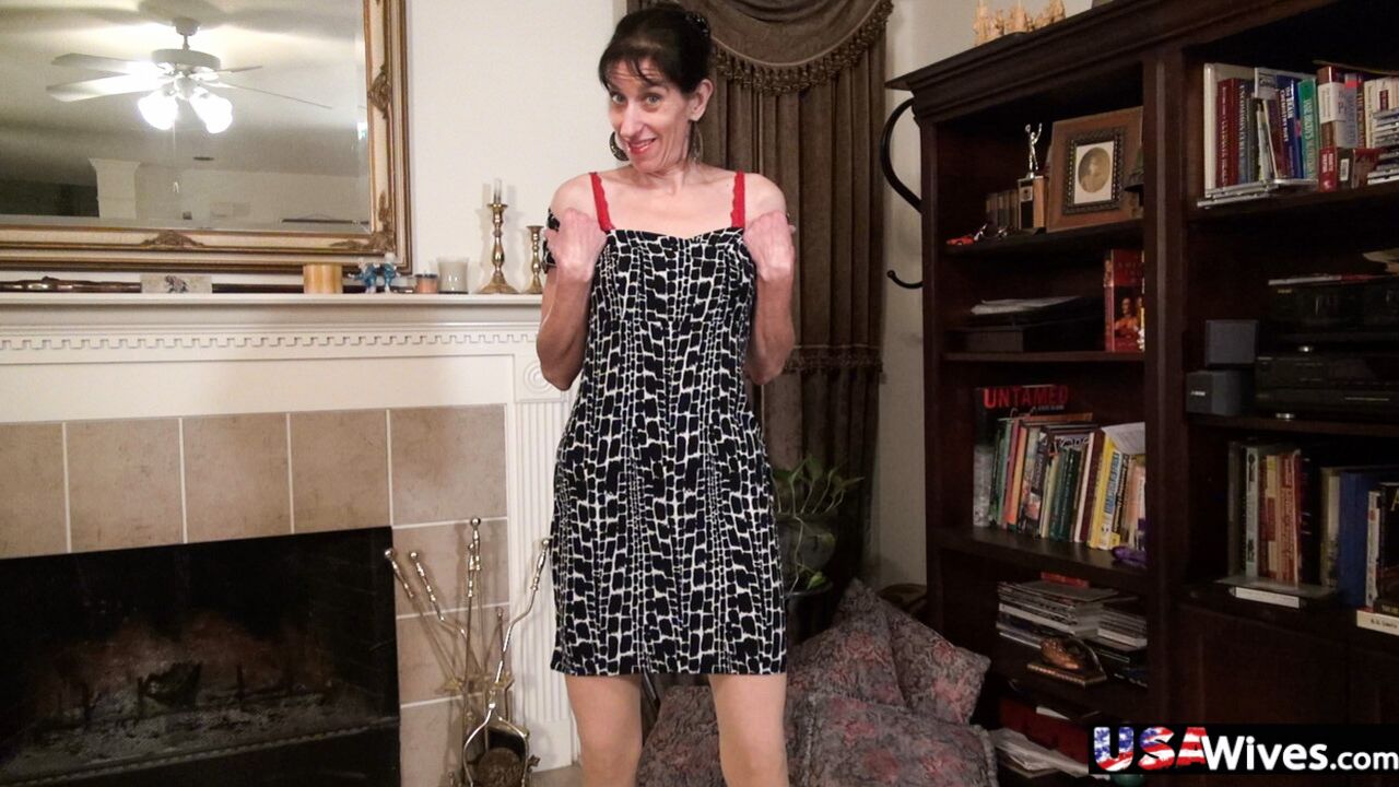 US WIFE PENNY JONES PLAYING WITH HER TOY