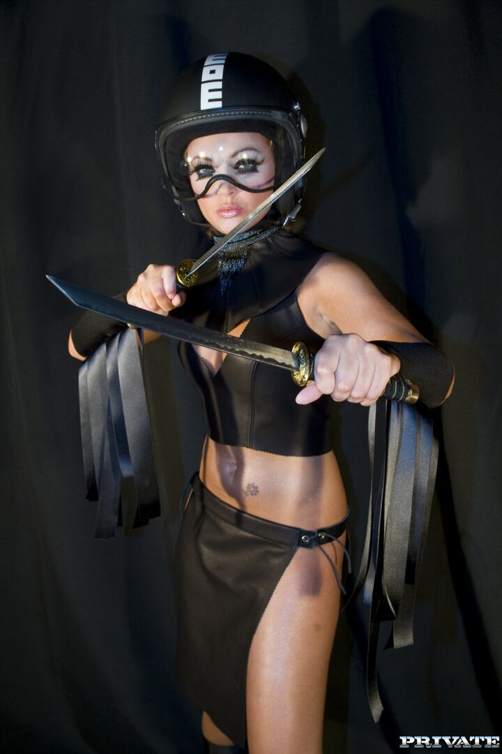 Terri Wears Her Helmet While Getting Double Penetrated by Two Guys