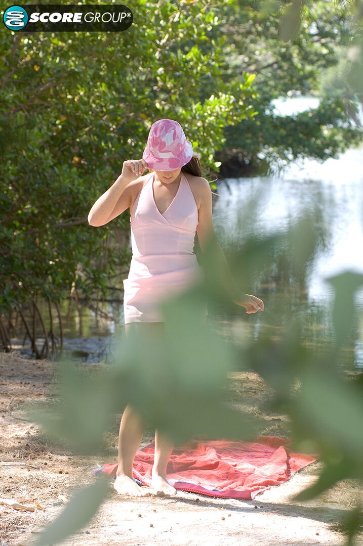 Ashlyn Lee goes fishing, but she would rather enjoy a masturbation session on the sand. She gets caught on-camera by our voyeur videographer.