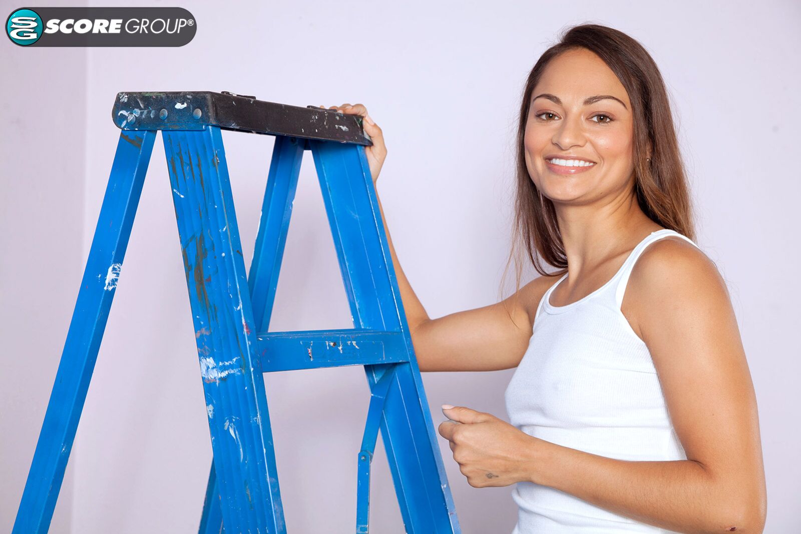 Valentina Vixen's hard nips poke through her white shirt. She strips on a ladder and then fingers her snatch.