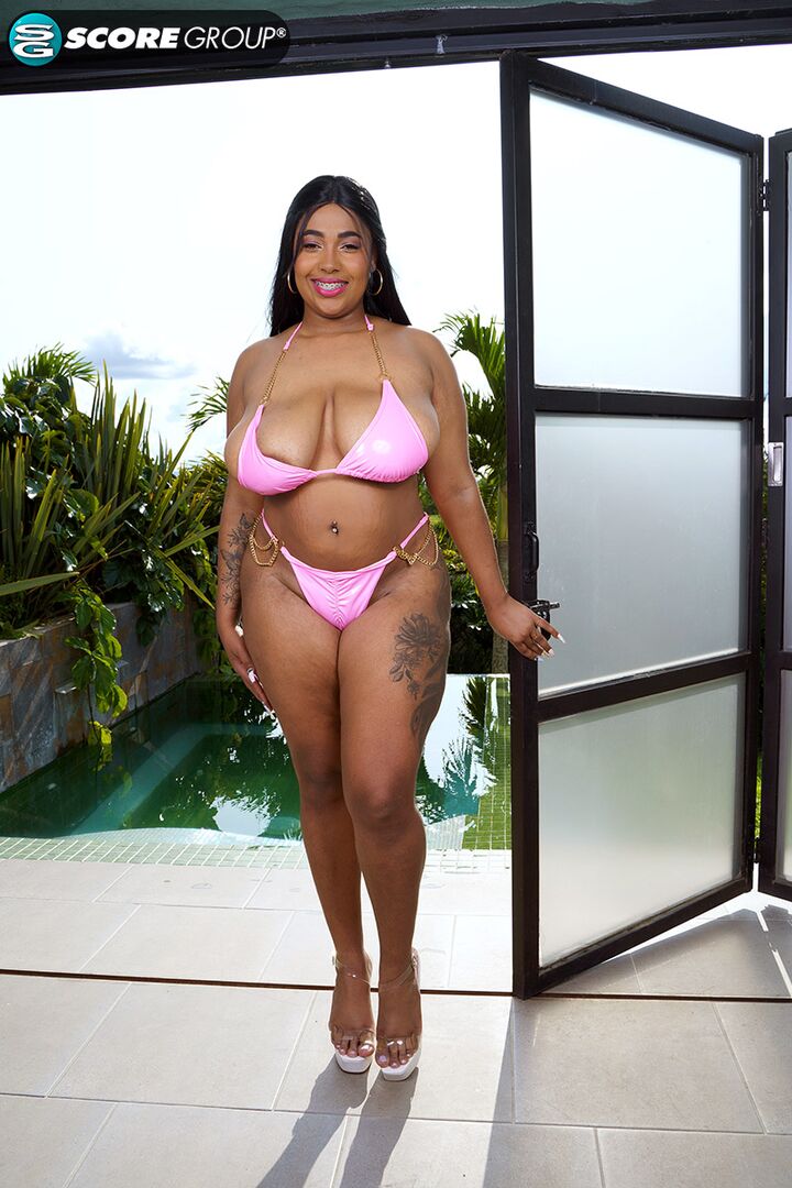 Thick and busty bikini babe Thayana deep-fingers her plump pussy