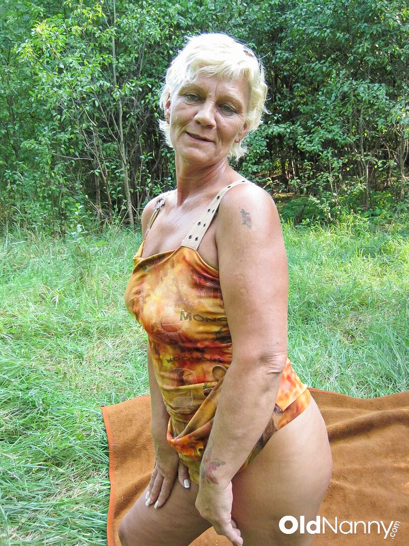 OLDER BLONDE GETS HER HAIRY PUSSY FUCKED IN THE WOODS