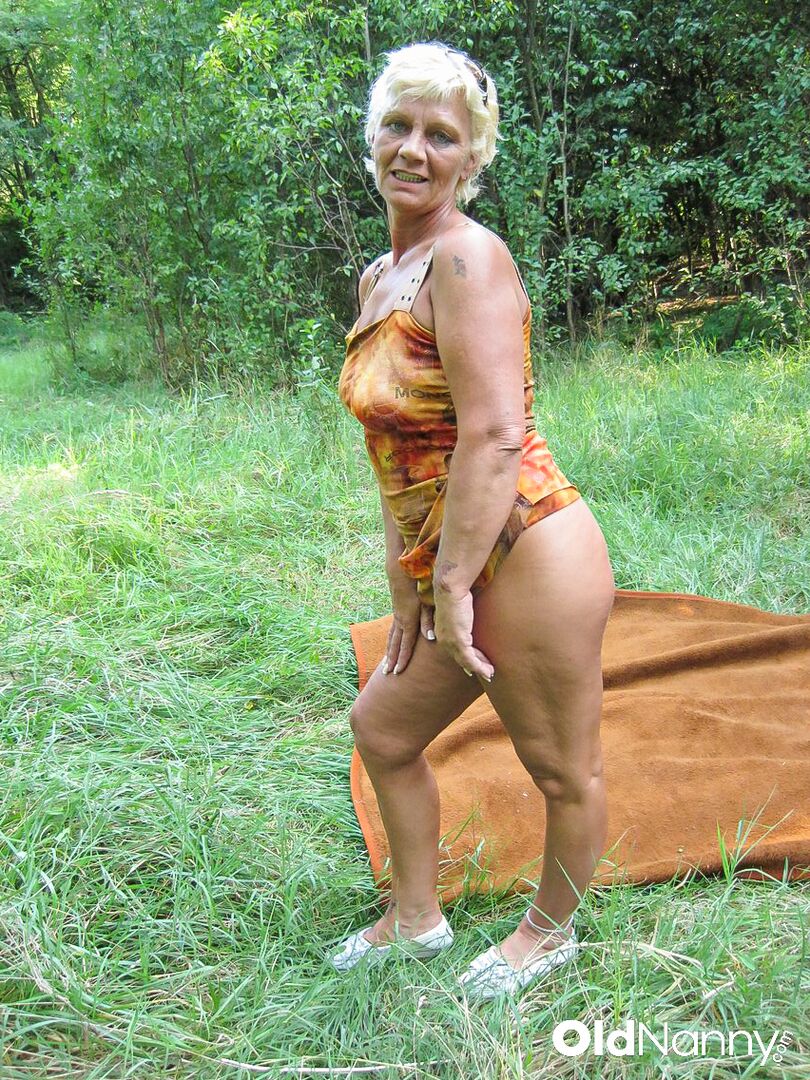 OLDER BLONDE GETS HER HAIRY PUSSY FUCKED IN THE WOODS