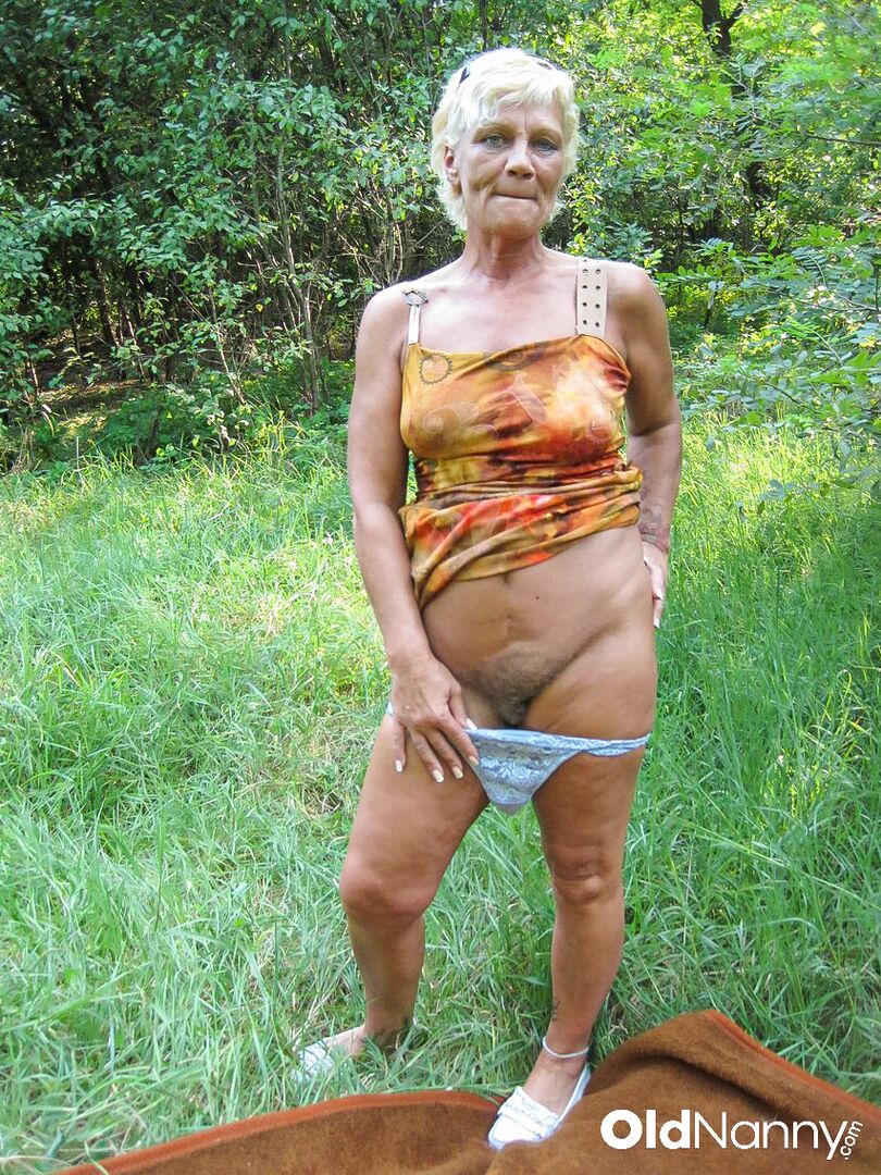 OLDER BLONDE GETS HER HAIRY PUSSY FUCKED IN THE WOODS