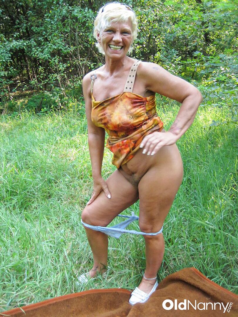 OLDER BLONDE GETS HER HAIRY PUSSY FUCKED IN THE WOODS