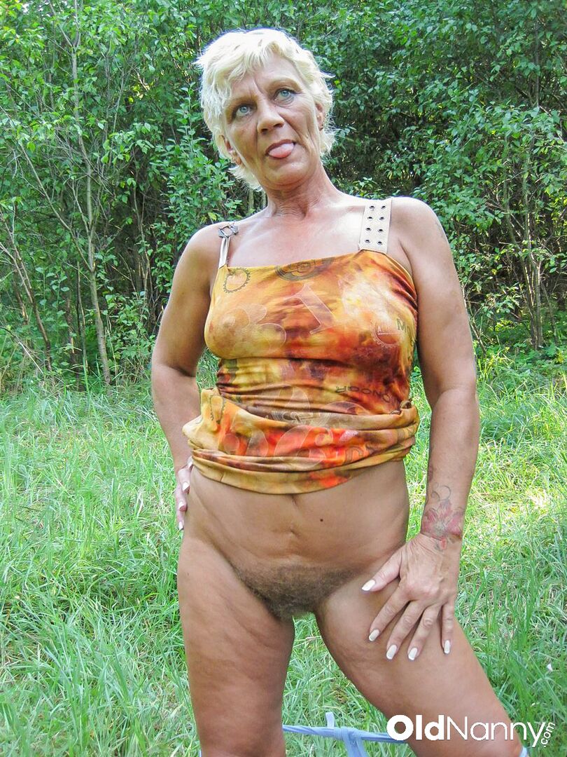 OLDER BLONDE GETS HER HAIRY PUSSY FUCKED IN THE WOODS