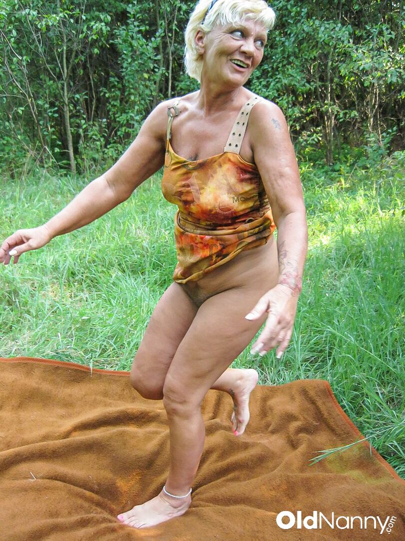 OLDER BLONDE GETS HER HAIRY PUSSY FUCKED IN THE WOODS