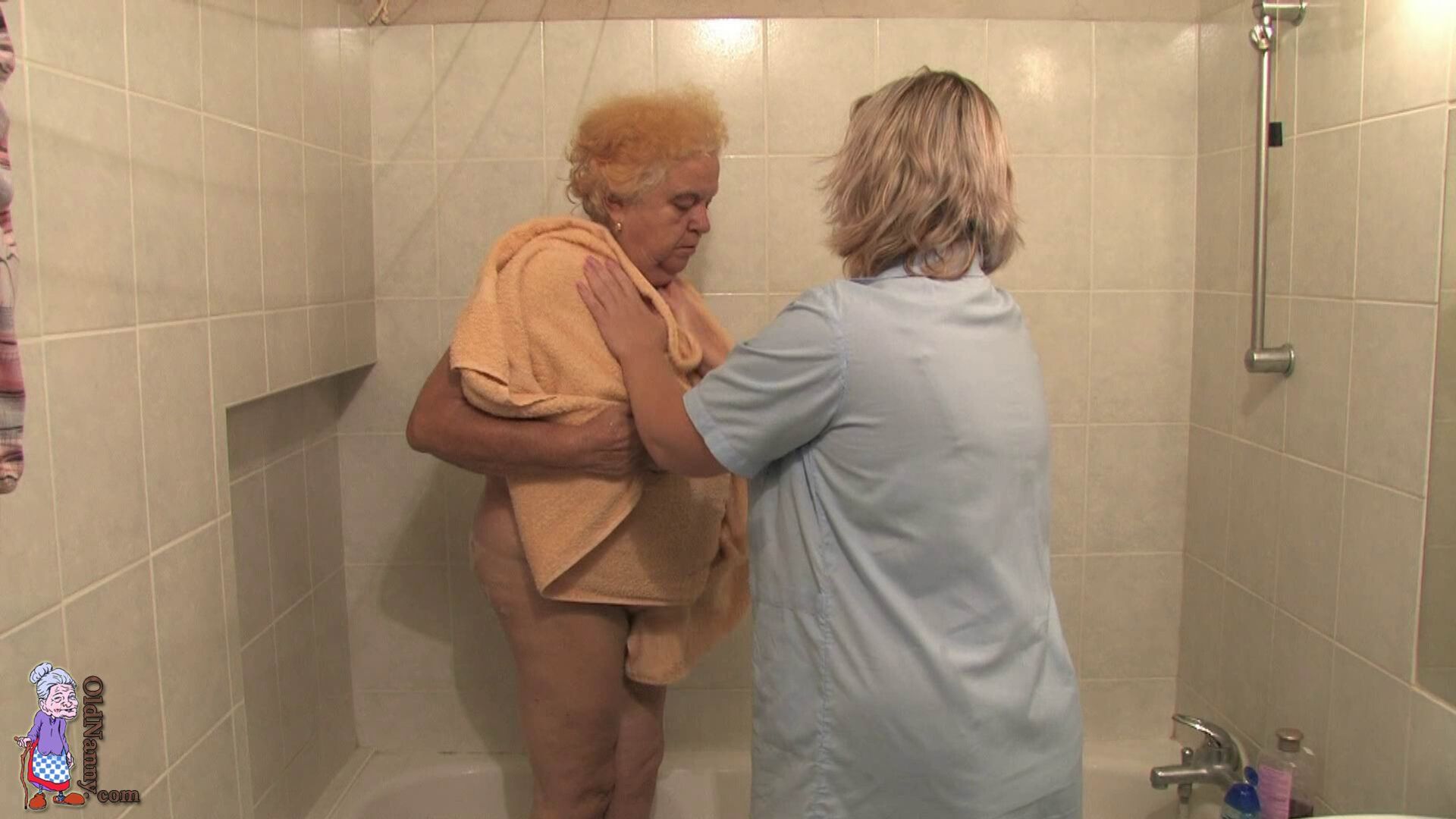 HERMINE GETTING BATHED BY HER CARETAKER