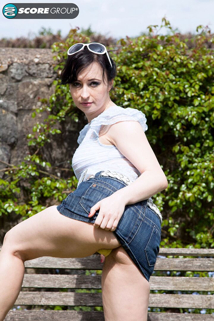 Jena flashes her hairy pussy outdoors