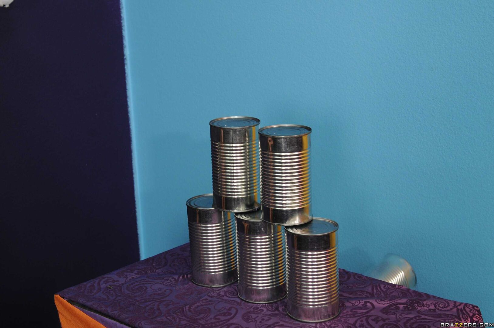 Throwing Balls At Her Cans