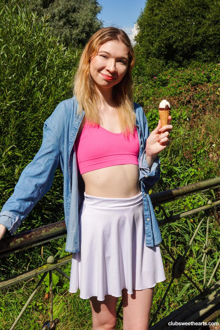 Licking Mia's ice cream