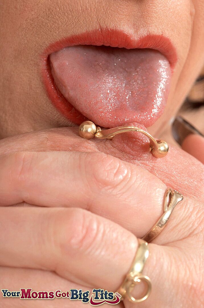DD-cup tits and 13 pussy piercings