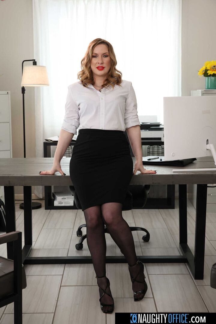 Sexy Sydney Paige uses her tight pussy to tame a big cock at the office