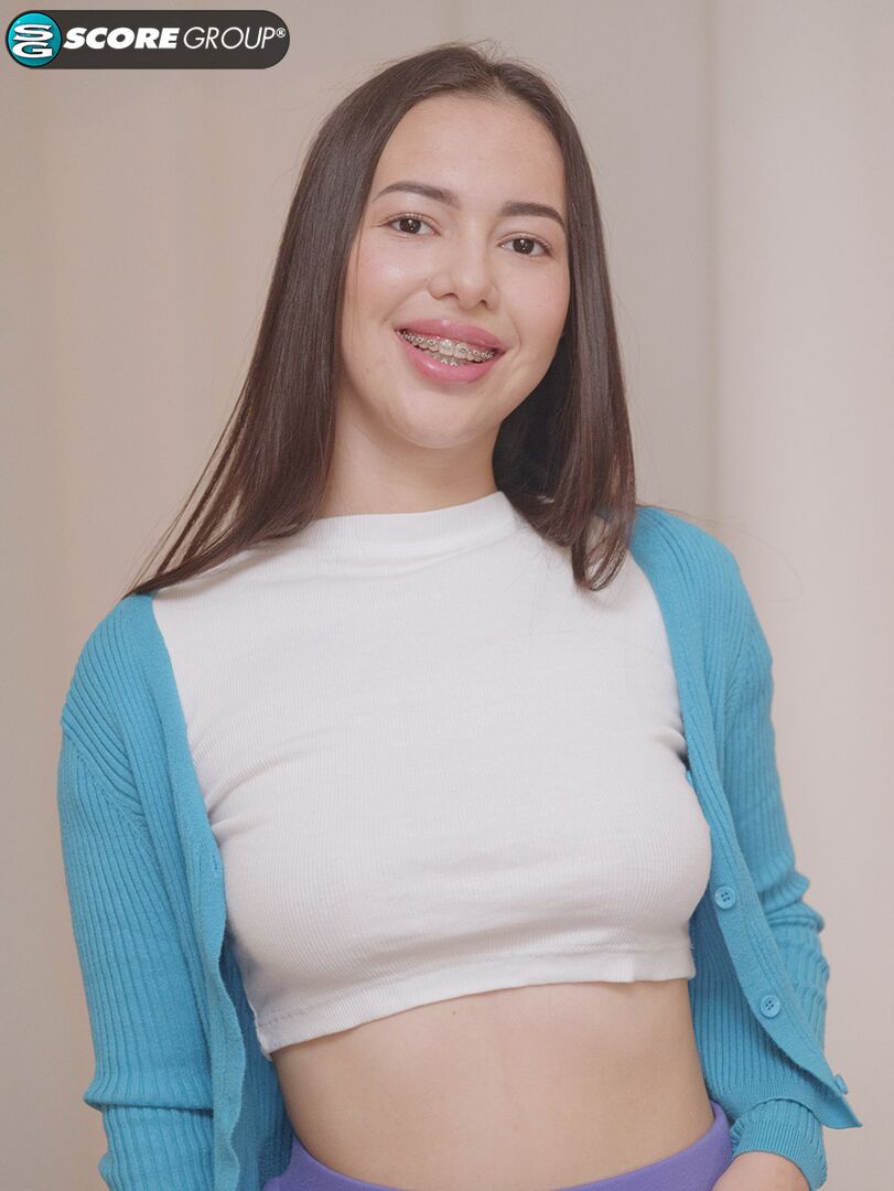Lola Li, 18, is a brace-face with perfect, perky knockers and a deliciously juicy pussy that she slams with a big dildo.