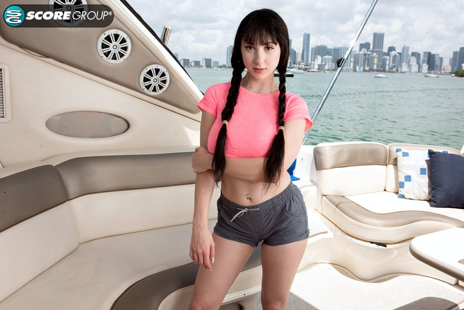 Dylann Vox is a super-busty, super-cute babe who strips nude, fingers her slit, massages her D-cups and cums on a boat in Miami.