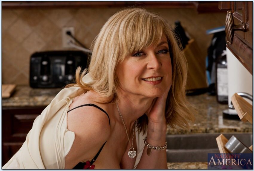Nina Hartley fucking in the kitchen with her lingerie