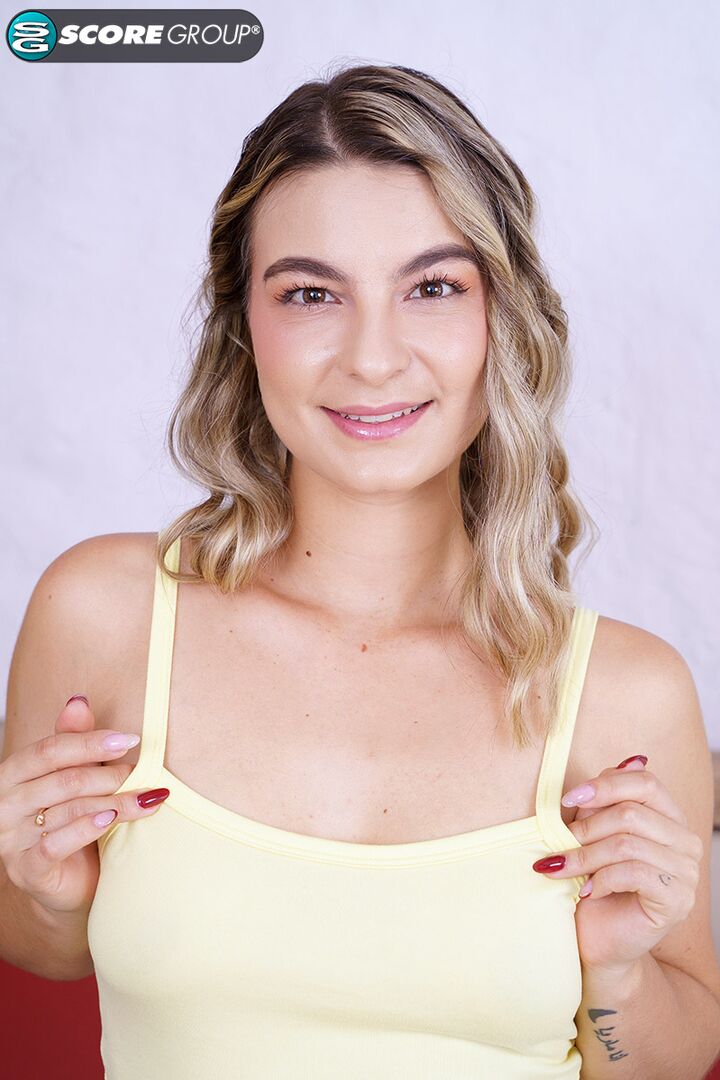 Newcomer Lia Tovar's butt hangs out of her cutoff shorts. She shows off her small boobs and fingers her slit.
