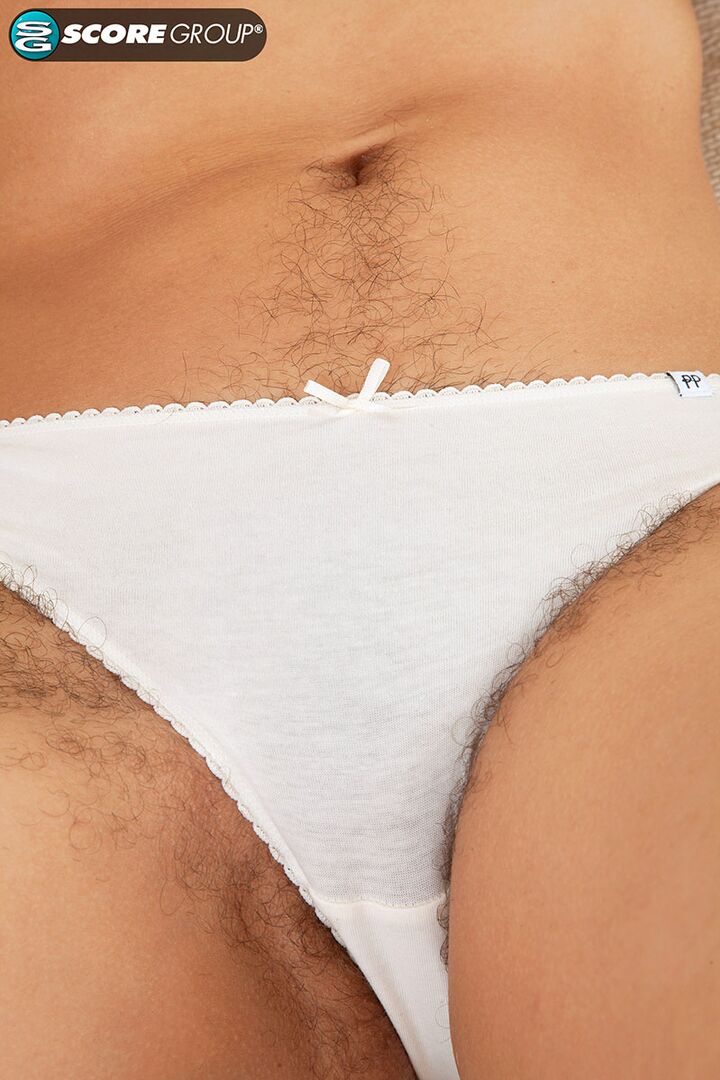 Zoom in and get close to Simone's hairy pussy