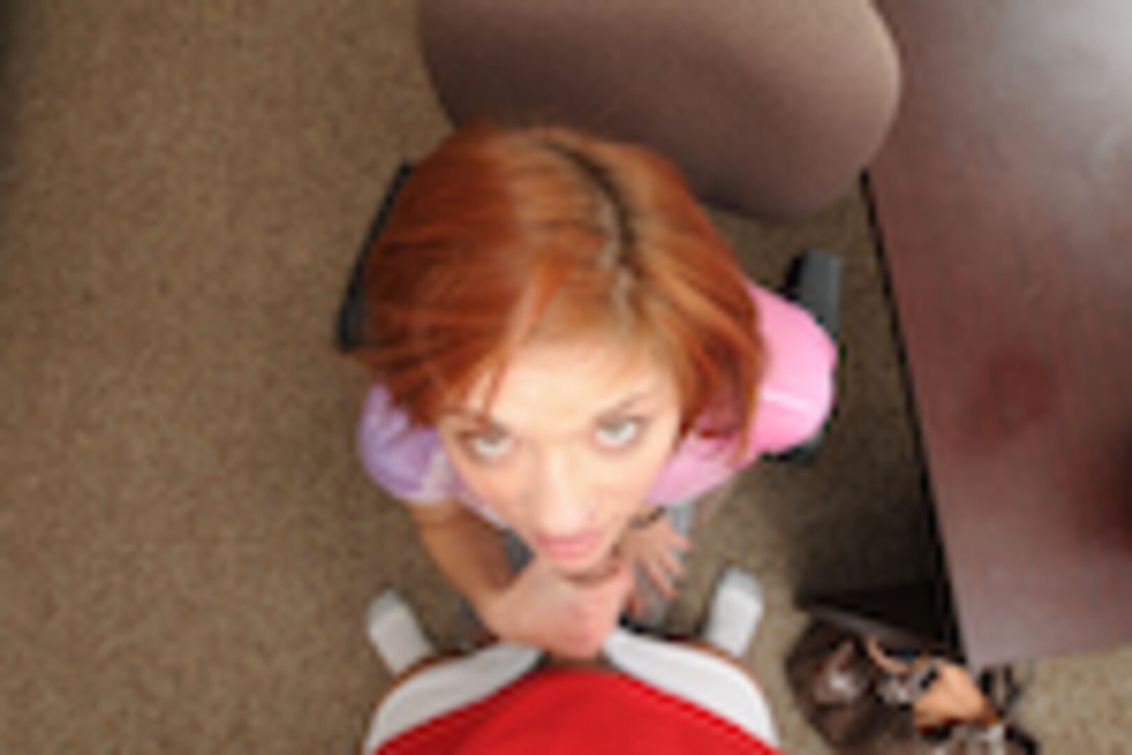 Pretty Redhead takes a huge load