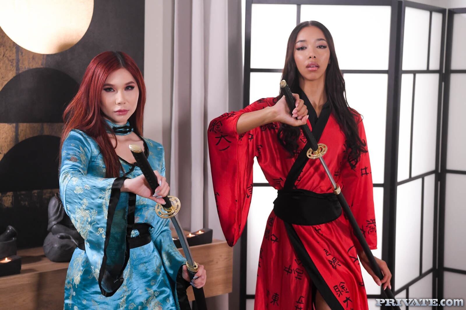 Asians Lia Lin and April Máxima, and their masseur's katana