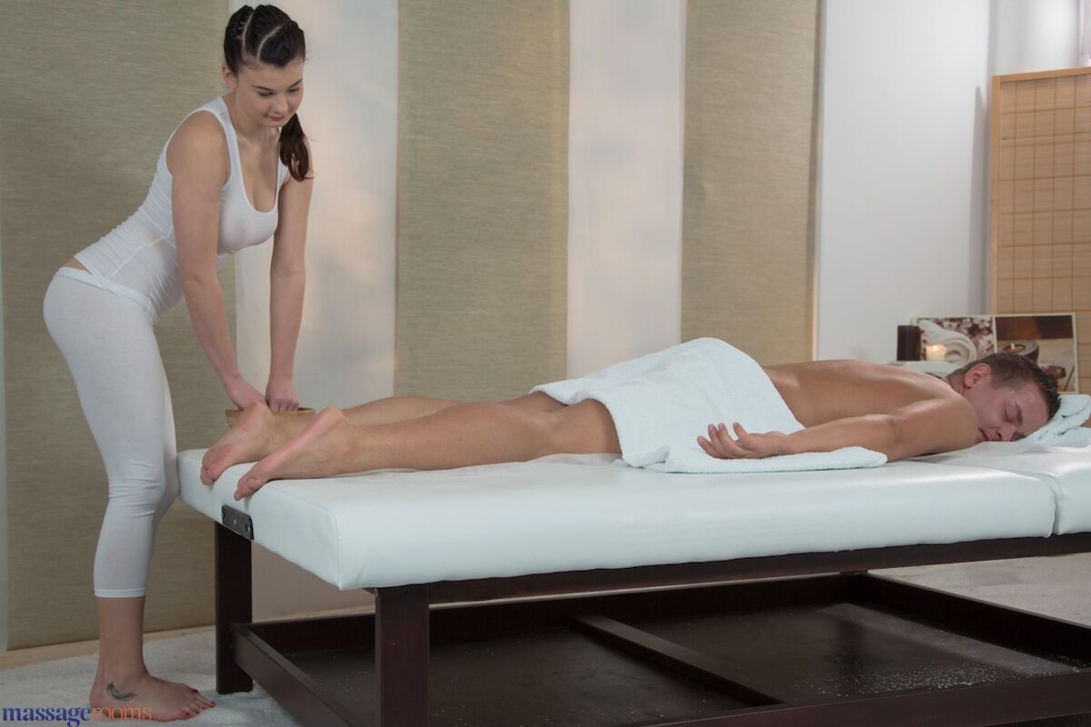Masseuse Bounces Her Tight Ass On Client's Dick
