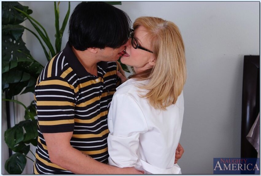 Petite Nina Hartley fucking in the bed with her petite